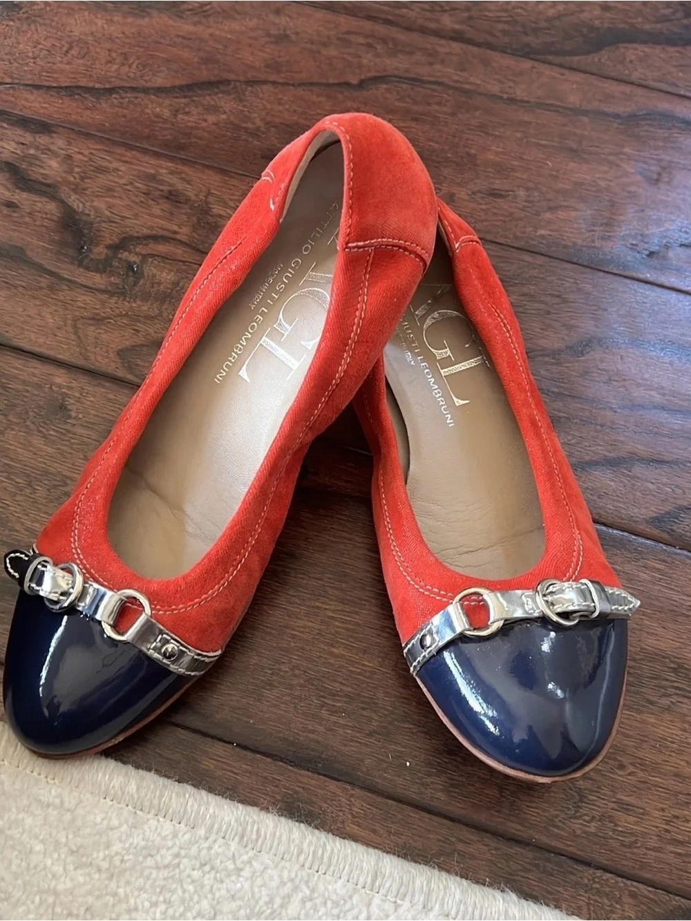 AGL Red Suede Flats with Navy Patent Cap-Toe and Silver Accent.